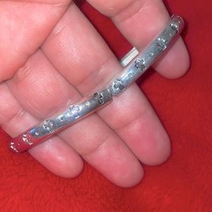 Pretty Silvertone Cross Detail Stretch Statement Bracelet